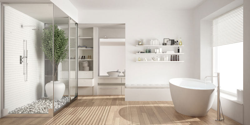 A modern bathroom with a large tub and walk-in shower. Explore high humidity flooring options to safeguard your floors from moisture damage.