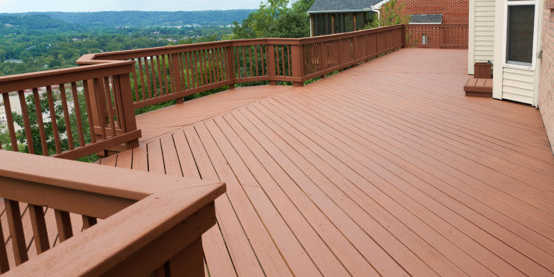 wooden deck with railings