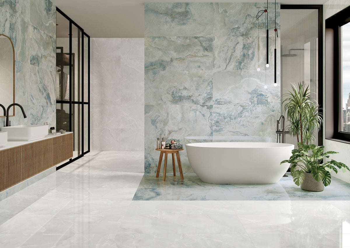 A modern bathroom interior featuring large blue porcelain tile wall that looks like modern marble.