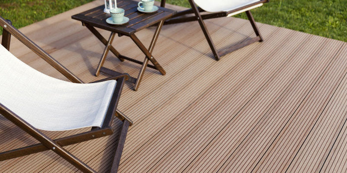  patio with brown composite decking and outdoor furniture