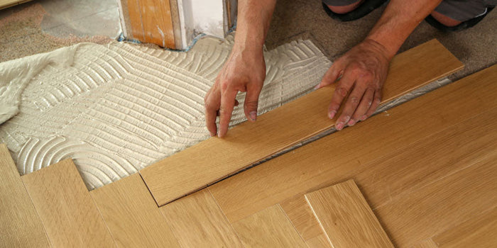 Image showing the glue down installation of a hardwood flooring