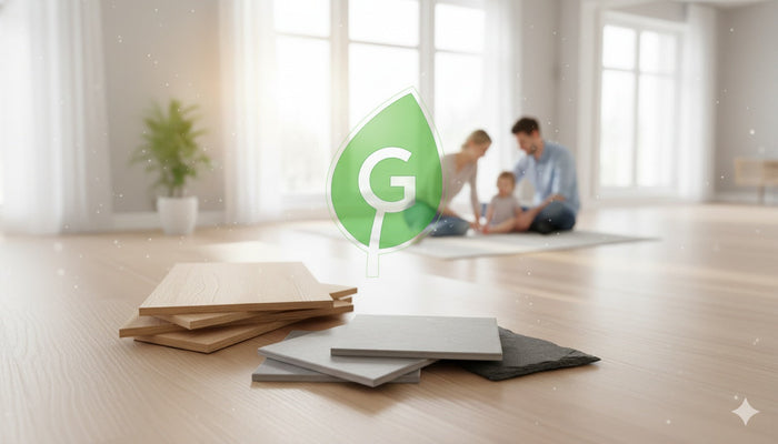 A family with a young child in a bright, modern living space with various flooring samples (wood, tile, slate) in the foreground. A glowing, transparent green leaf icon with a 