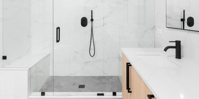 modern bathroom  and shower with marble and mosaic tiles