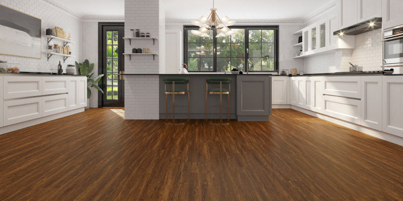 A kitchen with featuring a vinyl flooring