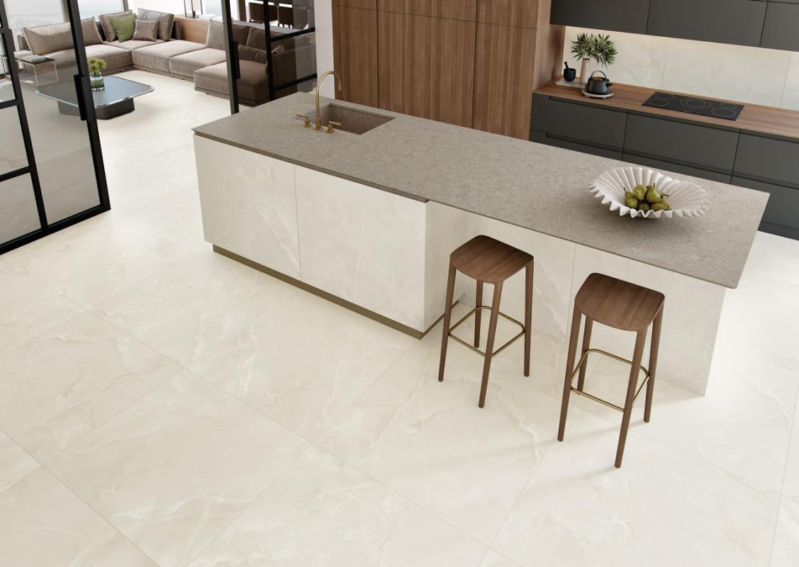 Modern kitchen with a island and bar stools on Soft White 12x24 Matte Porcelain Tile