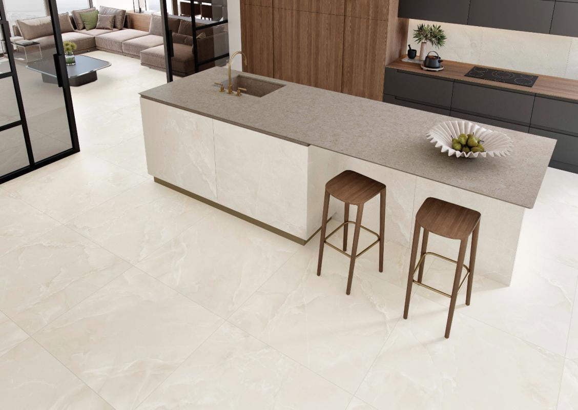 Modern kitchen with a island and bar stools on Spanish ivory porcelain tile floor