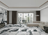 Modern living room with large scale porcelain tile floor and walls, sectional sofa, and large windows.