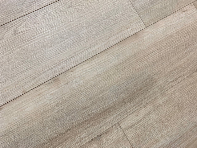 XL Peak Waterproof 5.5mm Rigid Core Luxury Vinyl Plank Flooring in Tusk — installed