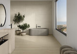 Modern bathroom with a bathtub, sink, and large window with decorative porcelain wall tiles