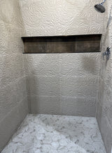 Tiled walk in shower with Calacatta Hex Glass Mosaic Tile floor